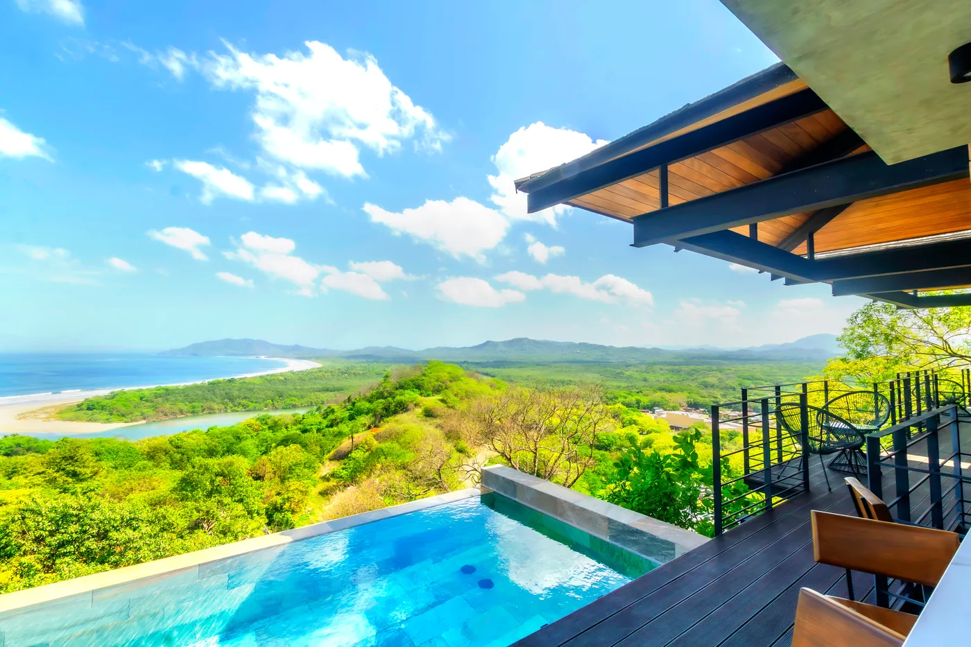 Infinity pool on the terrace looking out over the estuary and Tamarindo beach